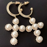 Pearl cross pendant earrings
