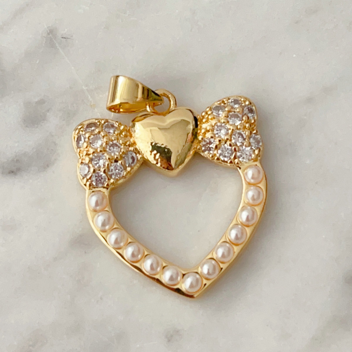 Pave bow heart charm