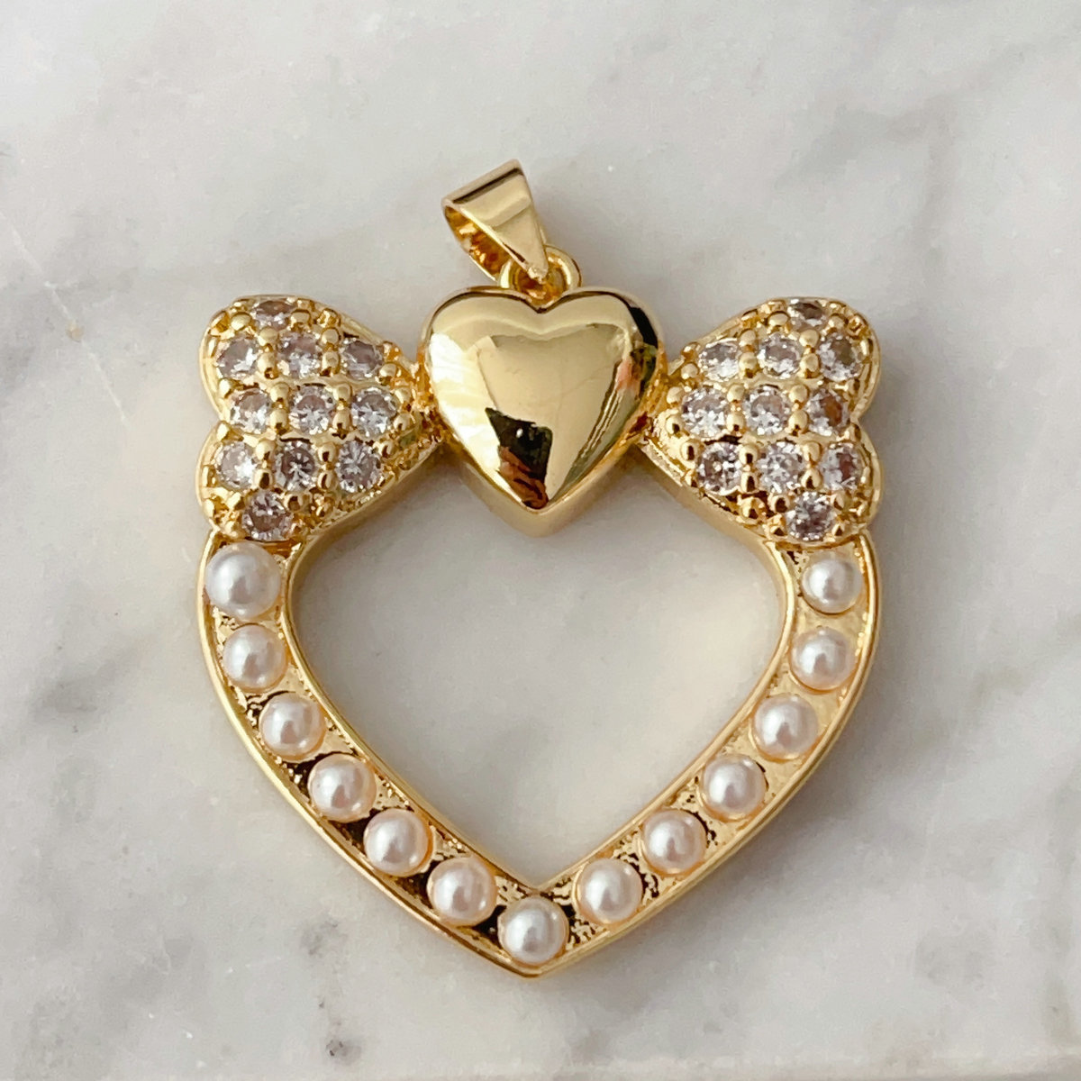Pearl bow heart charm