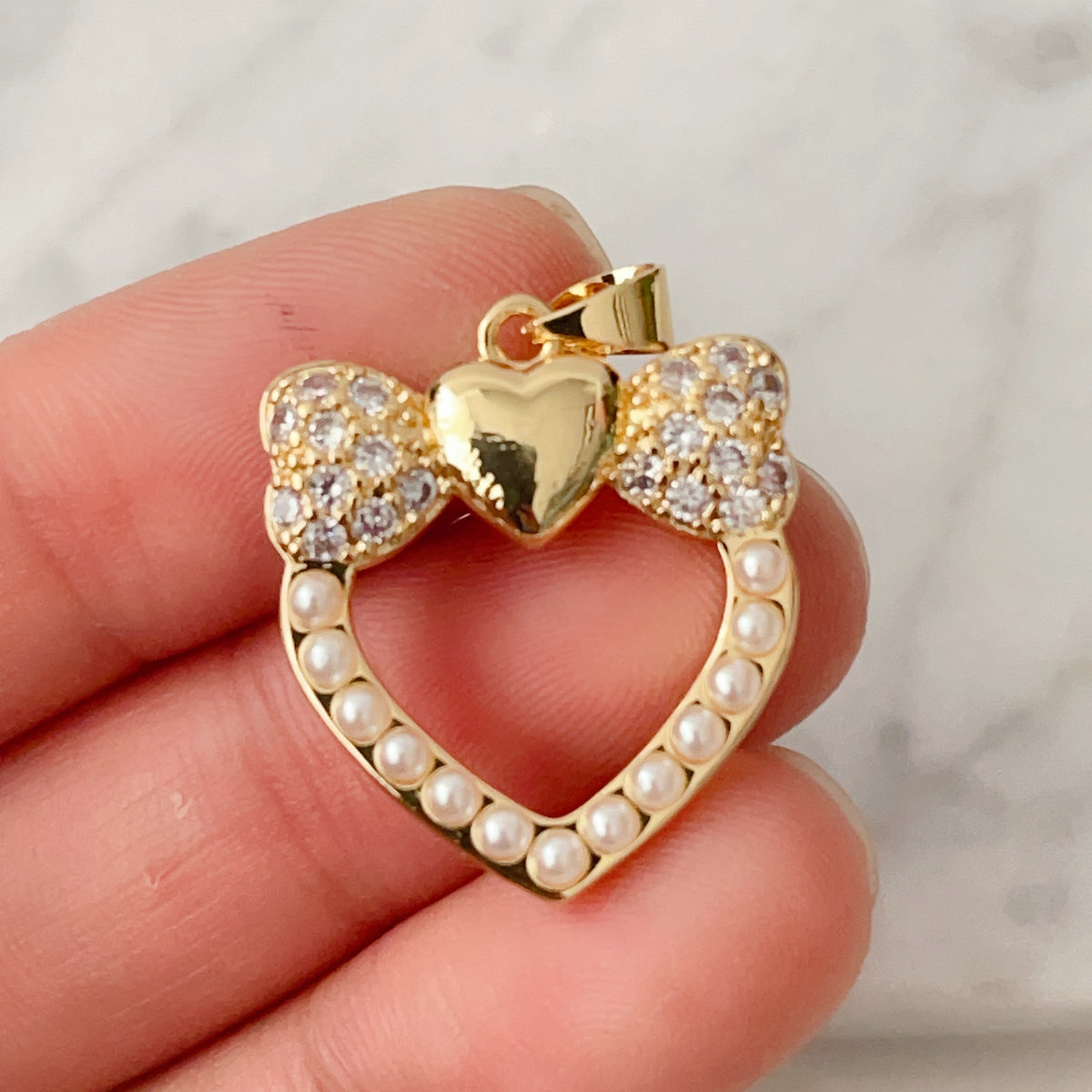 Pave bow heart charm