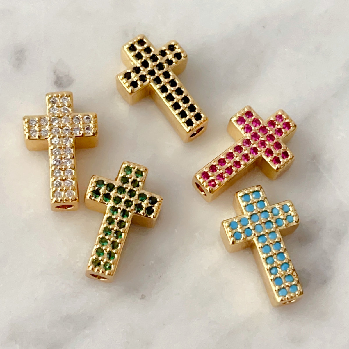 Zircon cross bead