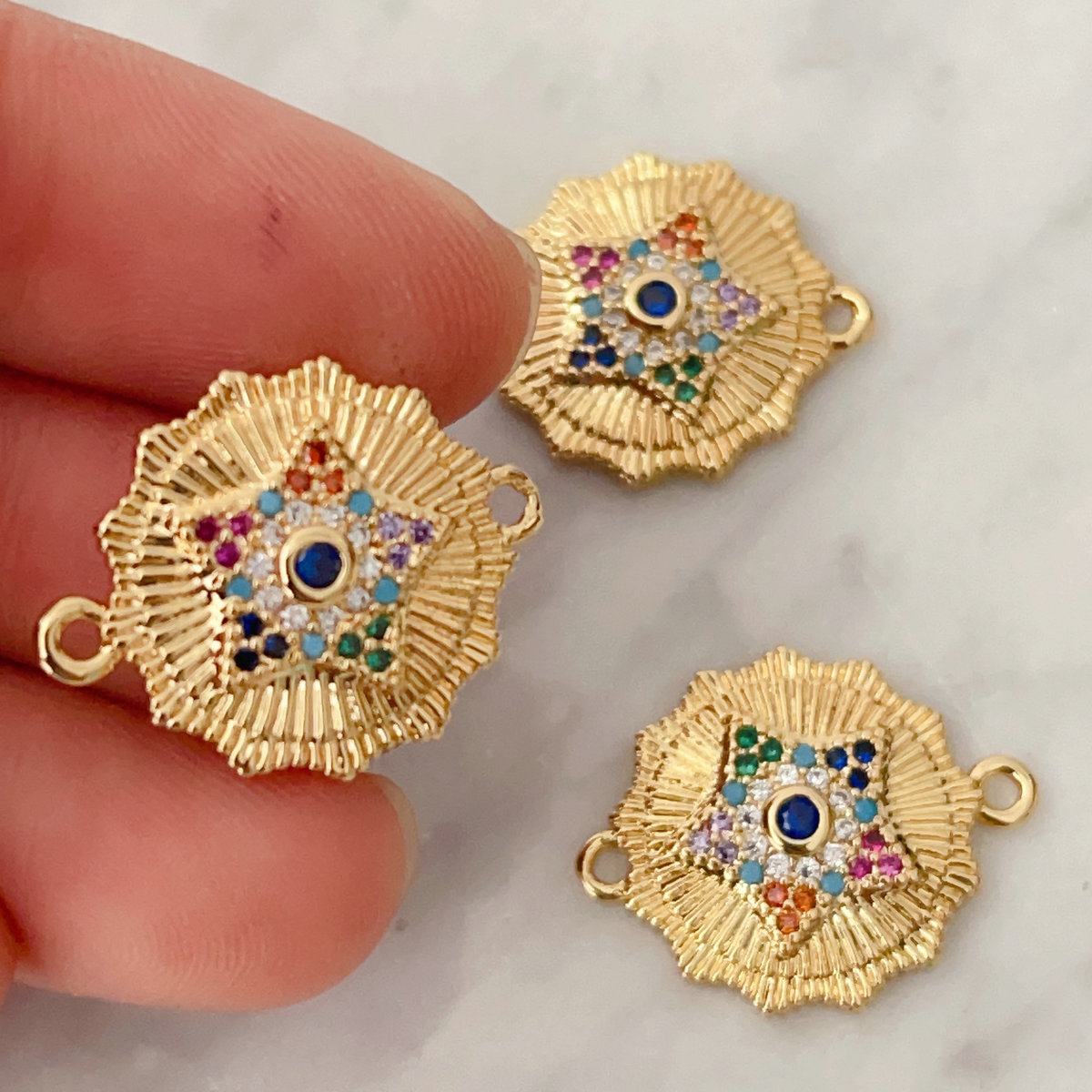 Pave star connector for bracelet