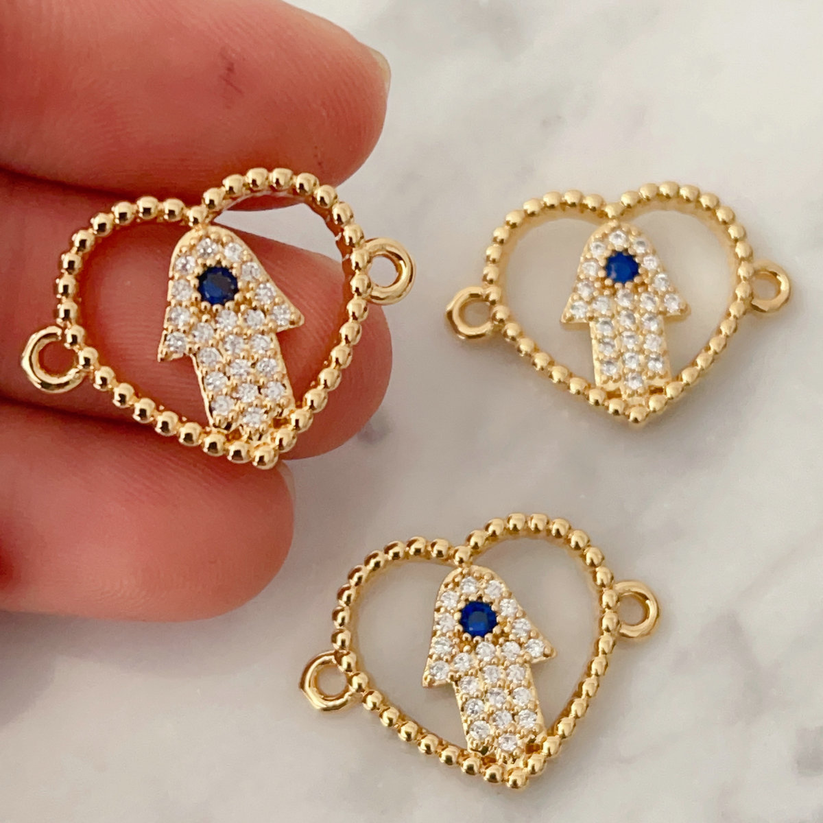 Pave hand connector for bracelet