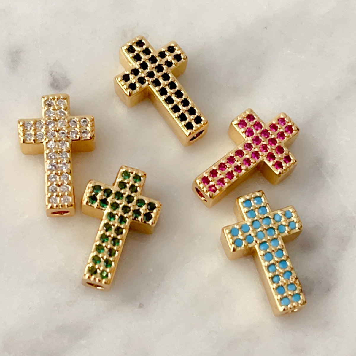 Zircon cross bead