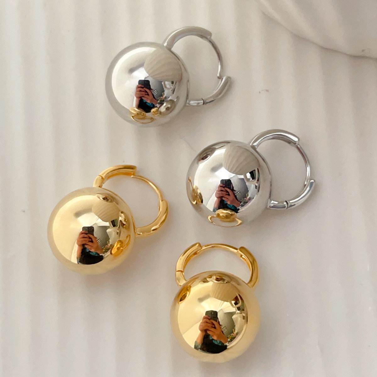 Gold ball hoop earrings