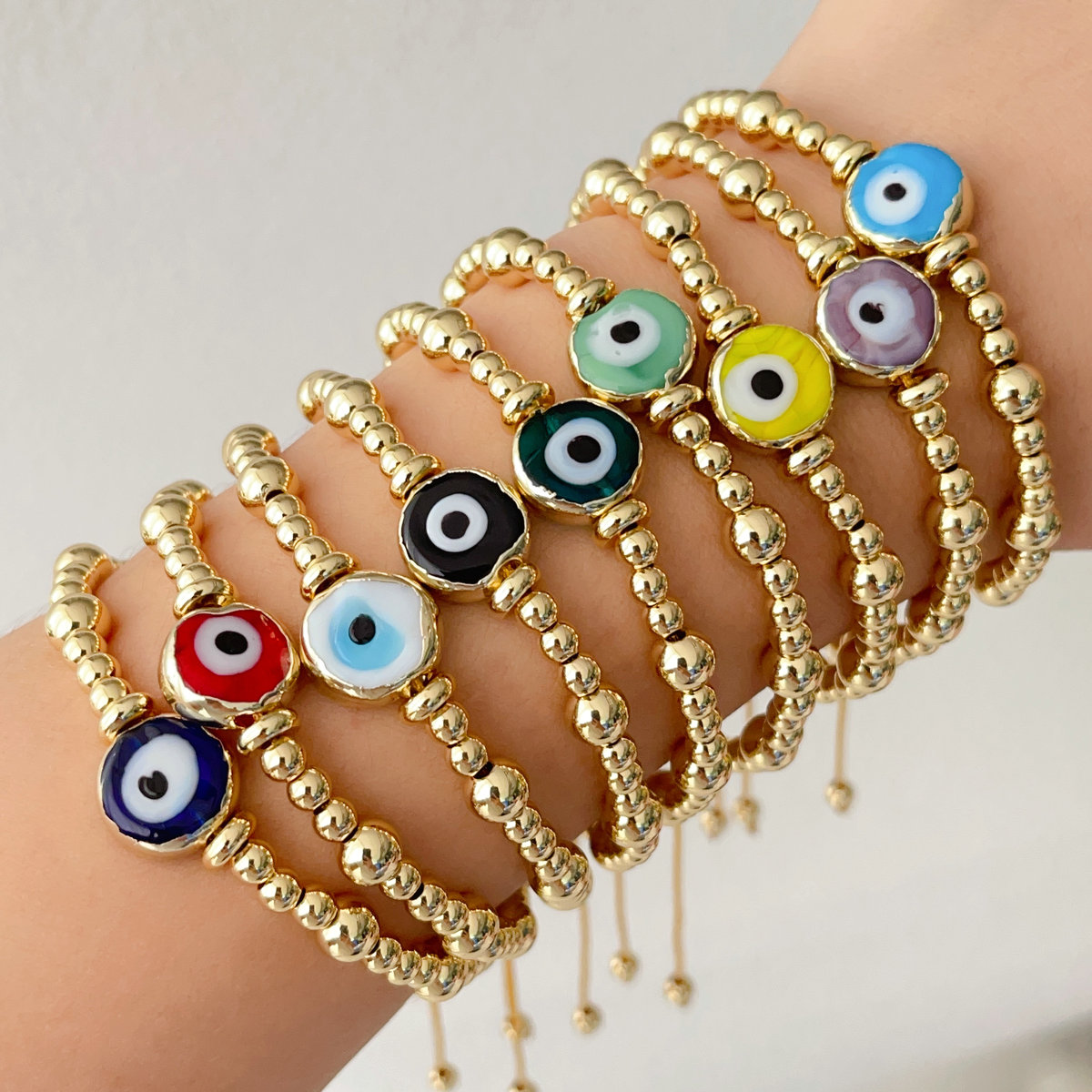 Gold ball with glass evil eye bracelet