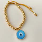 6mm gold bead bracelet with glass evil eye charm