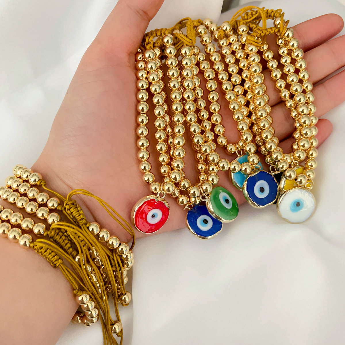 6mm gold bead bracelet with glass evil eye charm