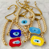 6mm gold bead bracelet with square glass evil eye charm