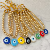 6mm gold bead bracelet with glass evil eye charm