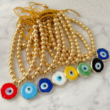 6mm gold bead bracelet with glass evil eye charm