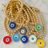 6mm gold bead bracelet with glass evil eye charm
