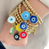 6mm gold bead bracelet with glass evil eye charm