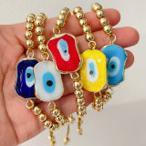 6mm gold bead bracelet with square glass evil eye charm