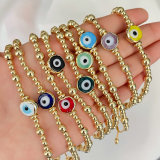 Gold ball with glass evil eye bracelet