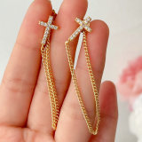 Cross chain tassel earrings