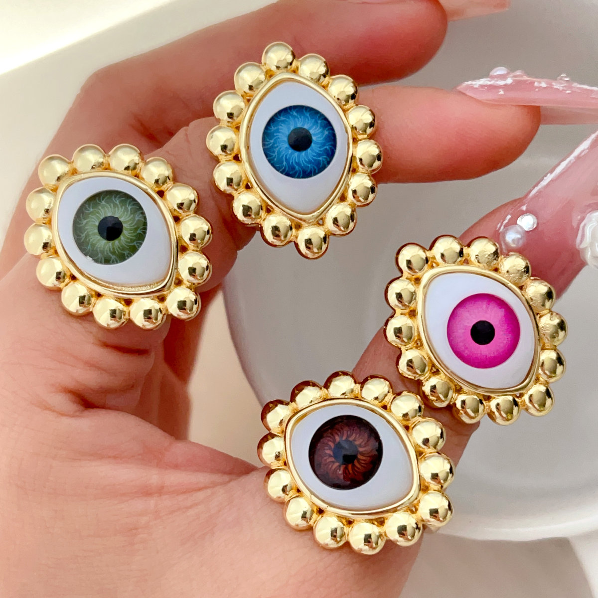 Gold ball evil eye adjustable ring