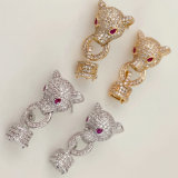 Pave leopard head earrings