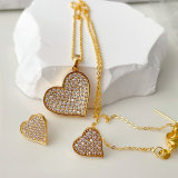 Pave heart set earrings wih pendant