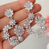 Pave cz flower earrings