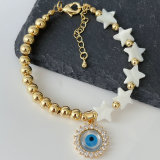 Half gold ball half pearl bracelet with mop evil charm