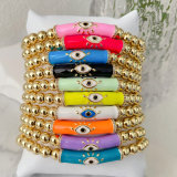 Evil eye elastic gold ball bracelet