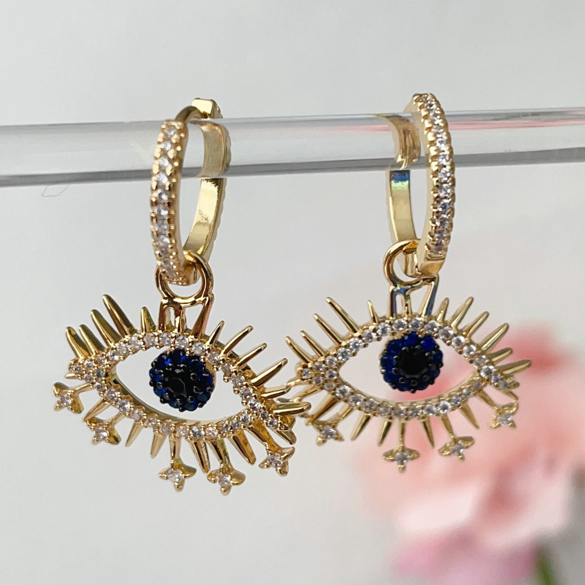 Pave cz blue eye drop earrings