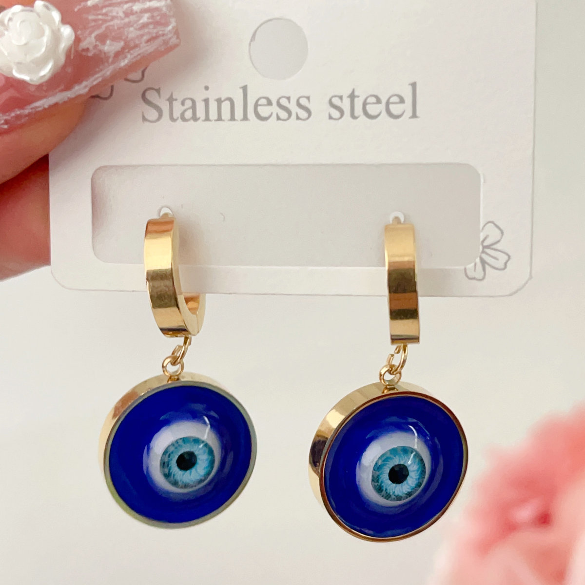 Stainless steel eye charm earrings