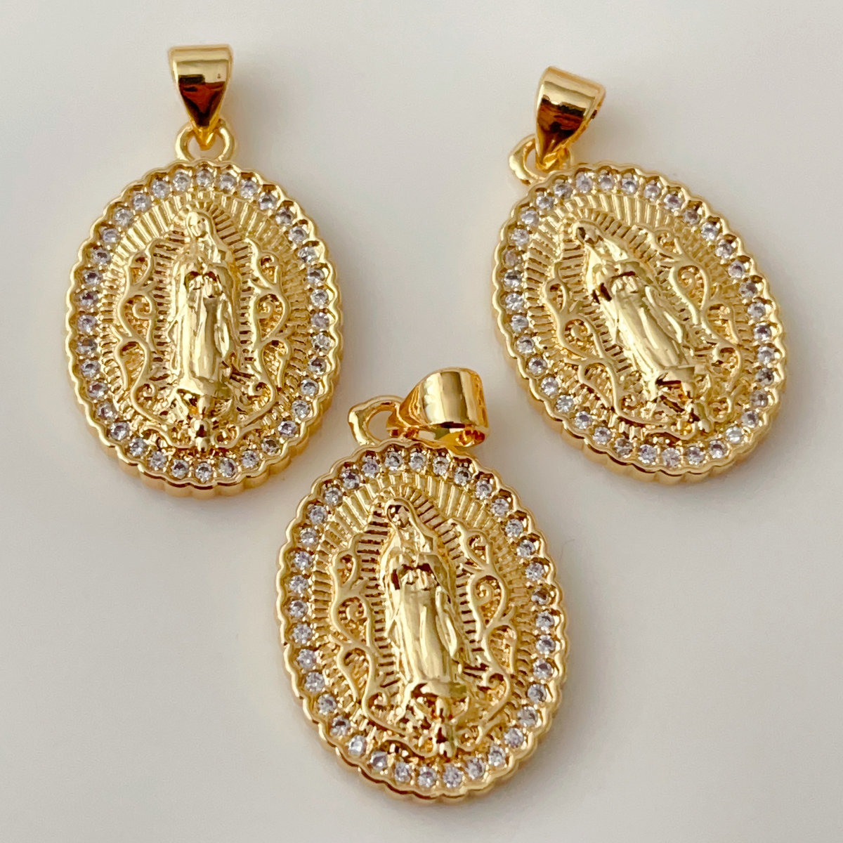 Pave oval religious series charm