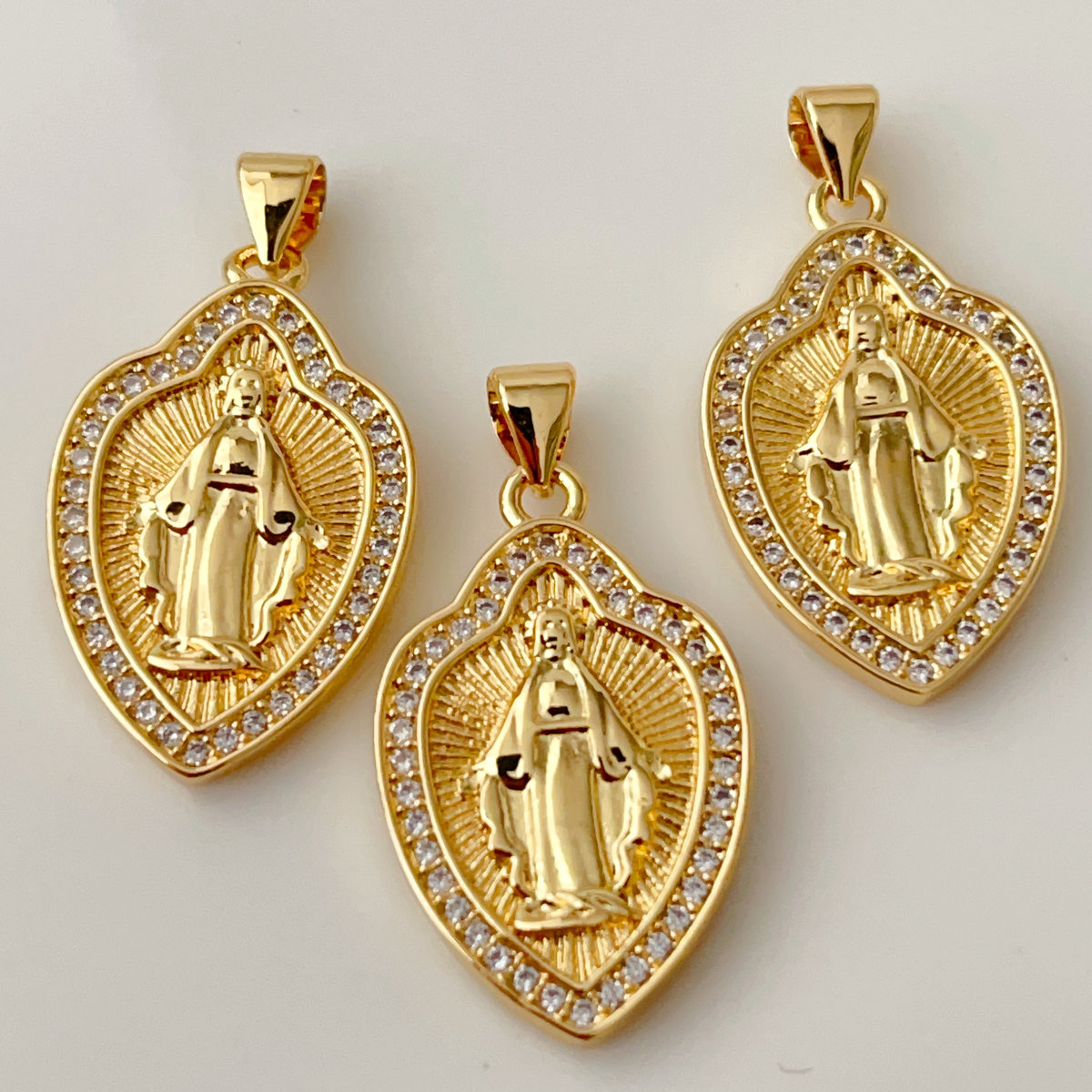 Oval religious series charm