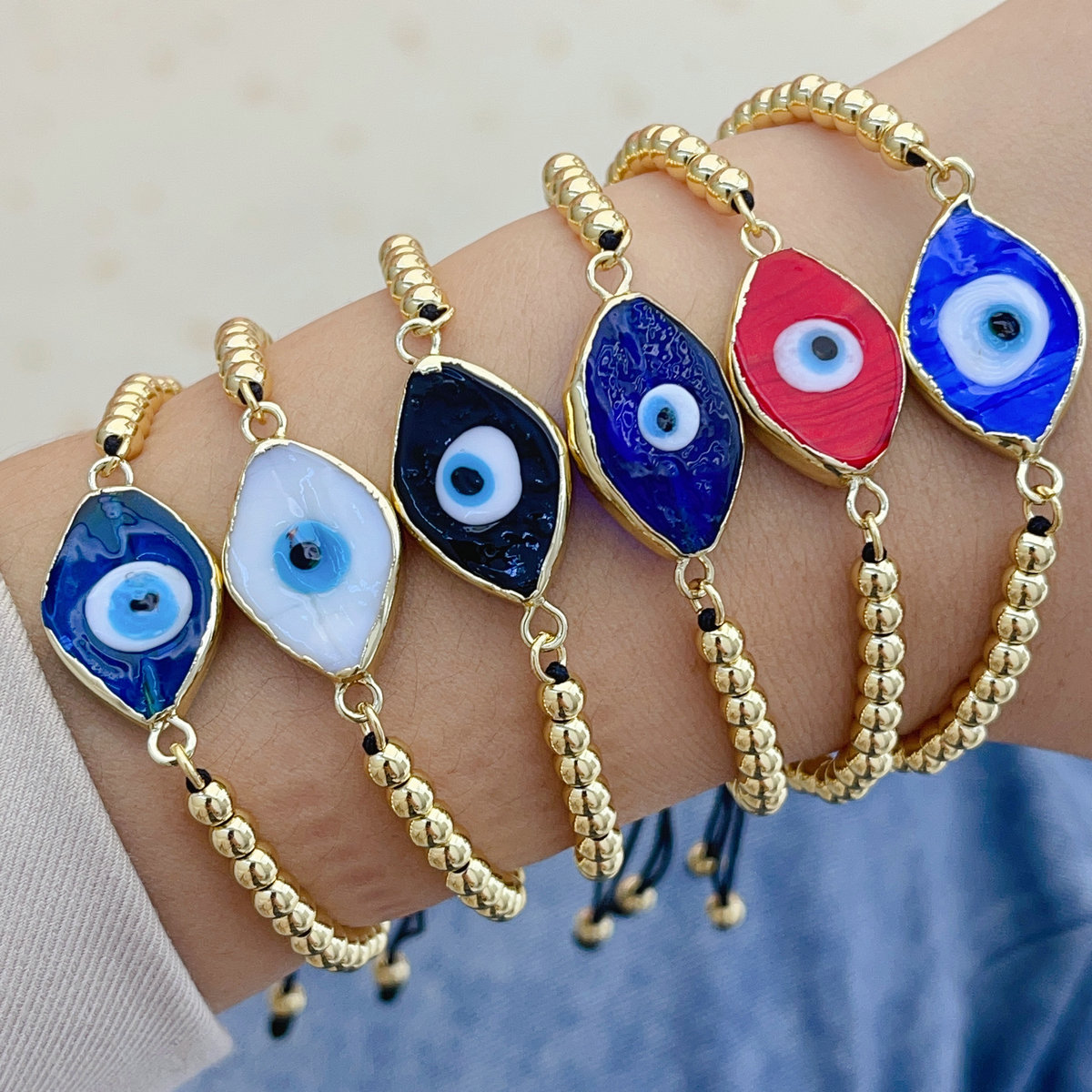 Glass evil eye gold bead bracelet