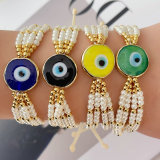Glass pearl evil eye bracelet