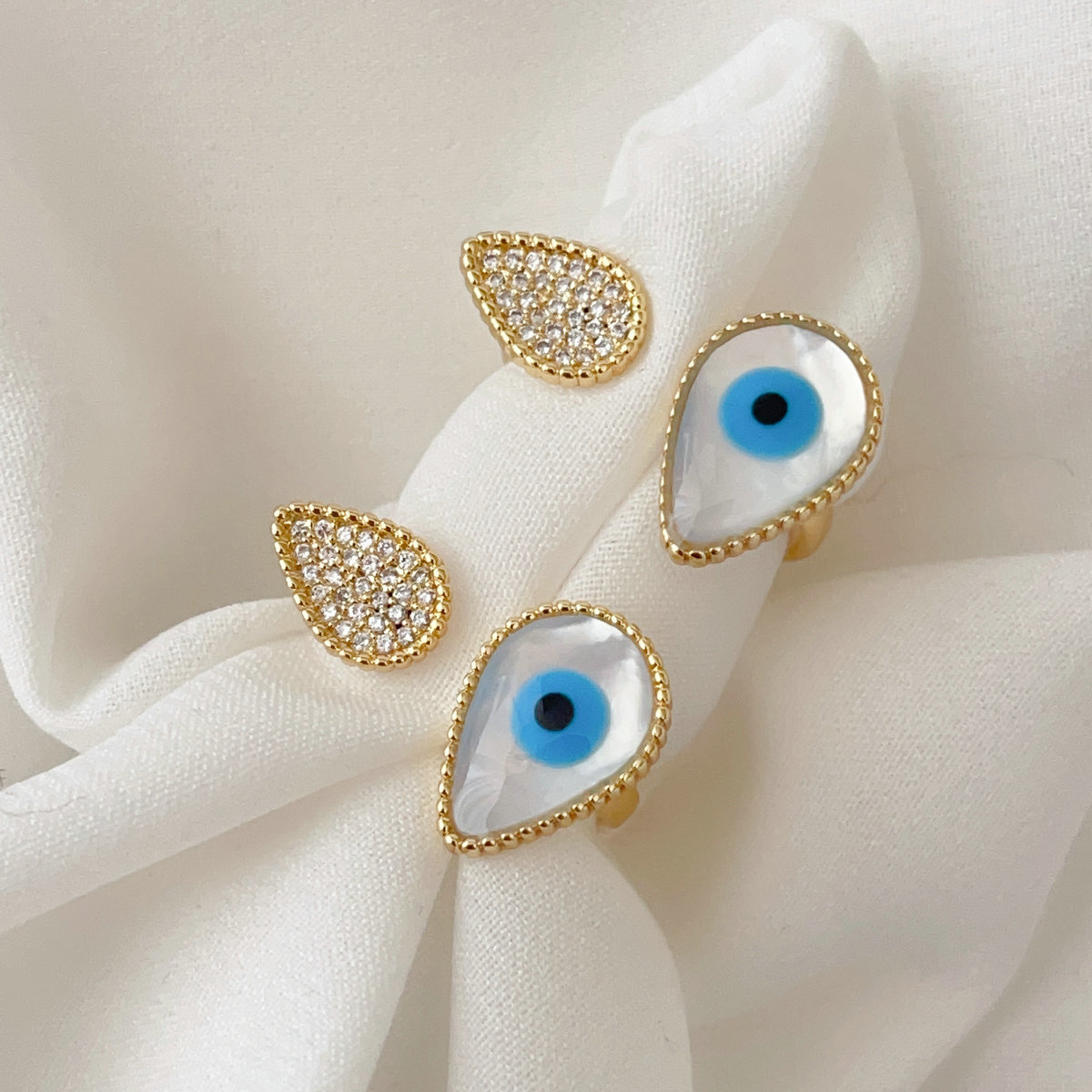 Oval mop white eye ring