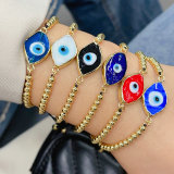 Glass evil eye gold bead bracelet
