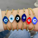 Glass evil eye gold bead bracelet