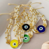 Glass pearl evil eye bracelet