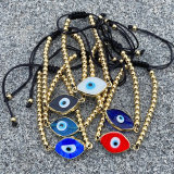 Glass evil eye gold bead bracelet