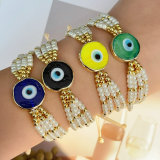 Glass pearl evil eye bracelet