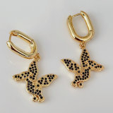 Black dinosaur drop earrings