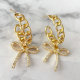 Chain hoops earrings with bow pendant