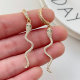 Pave snake earrings