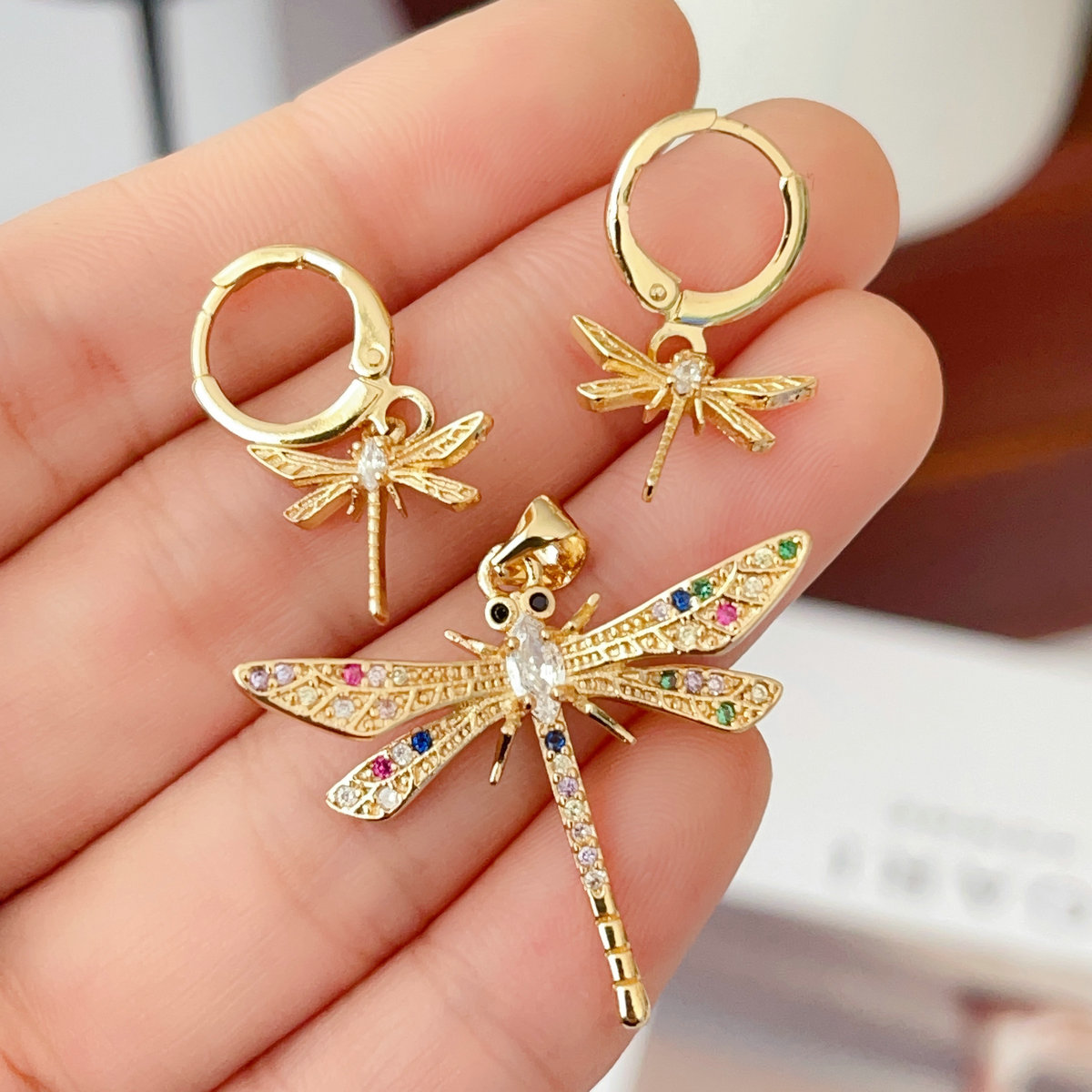 Set pave dragonfly earrings