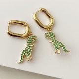 Green dinosaur drop earrings