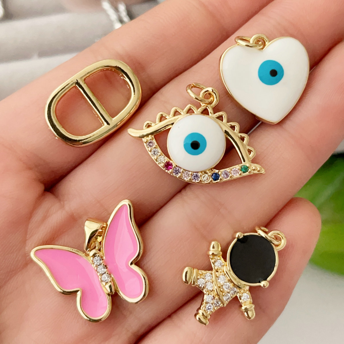 Eye . butterfly , bear charm
