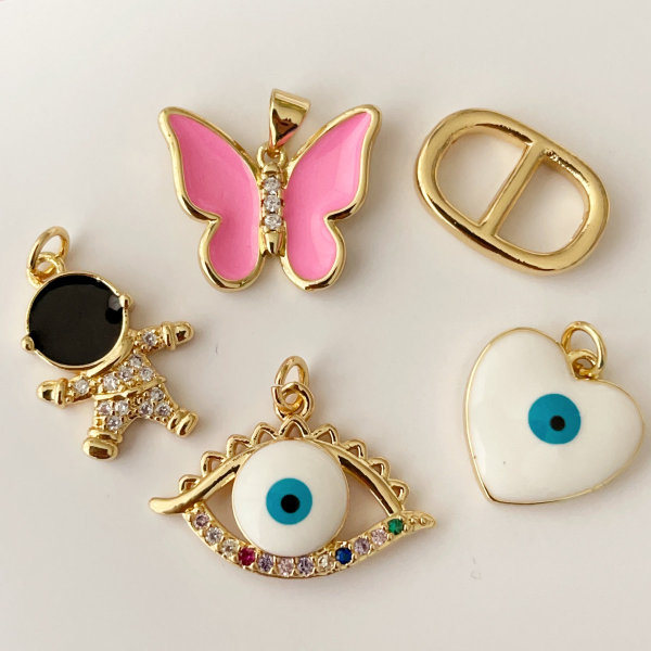 Eye . butterfly , bear charm