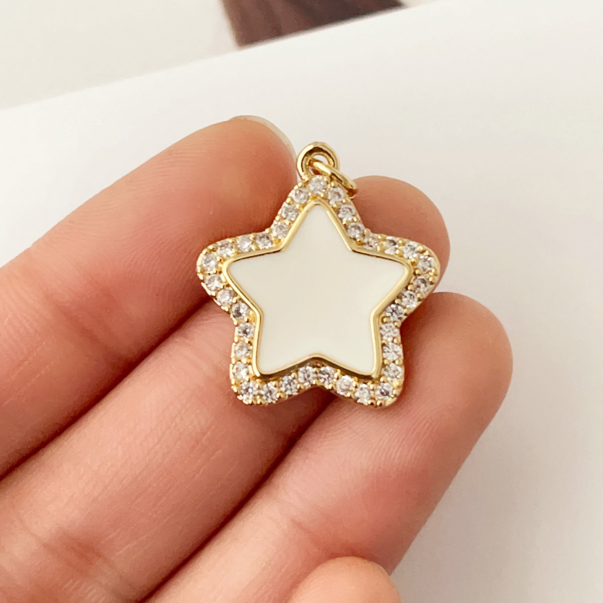 White enamel star charm