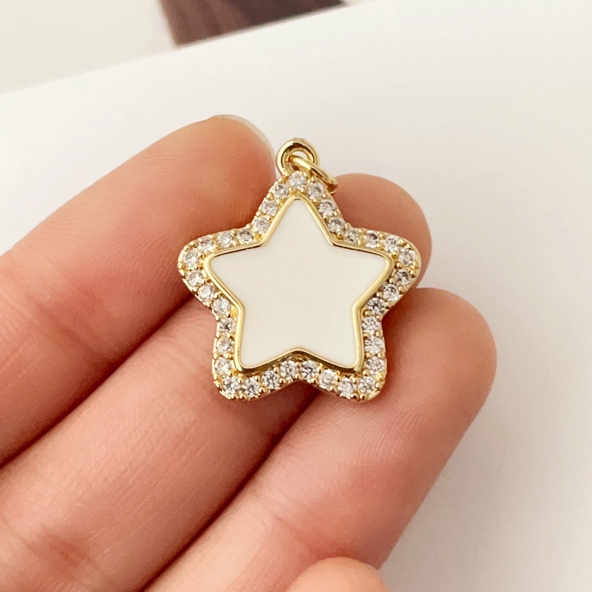 White enamel star charm