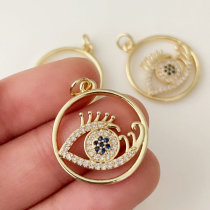 Pave round eye charm