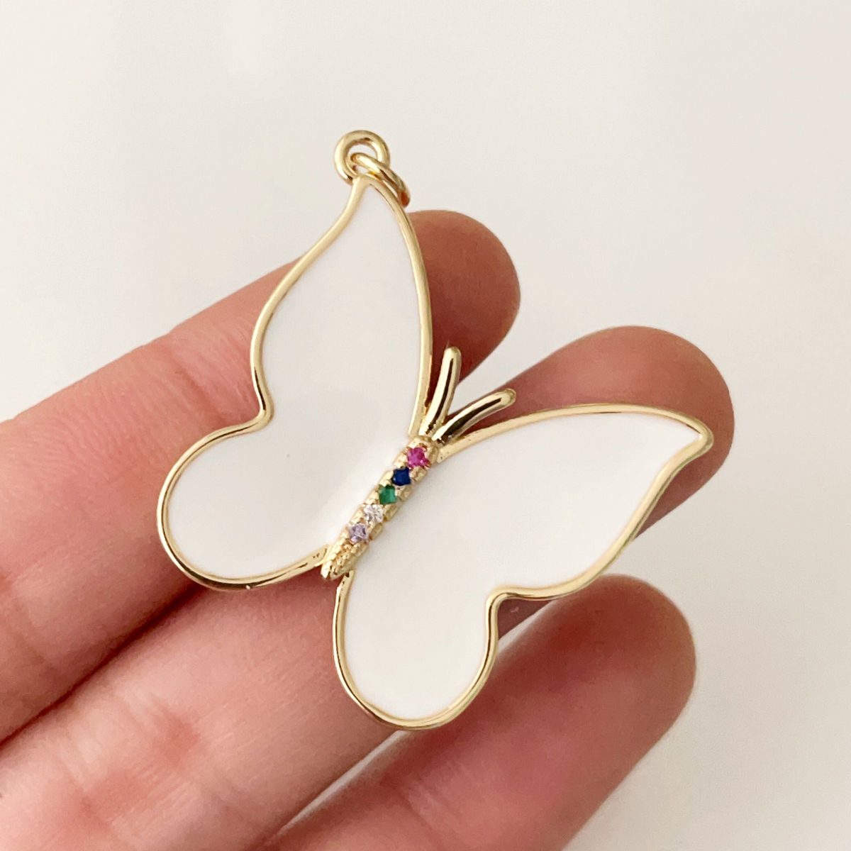 White enamel butterfly pendant