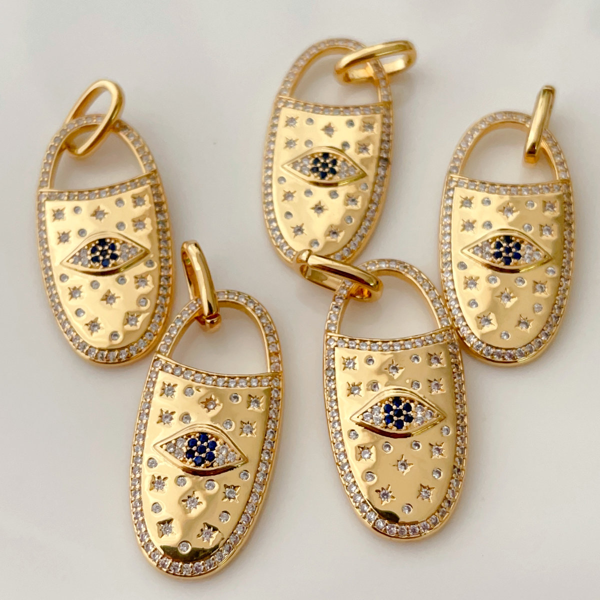 Pave eye long pendant